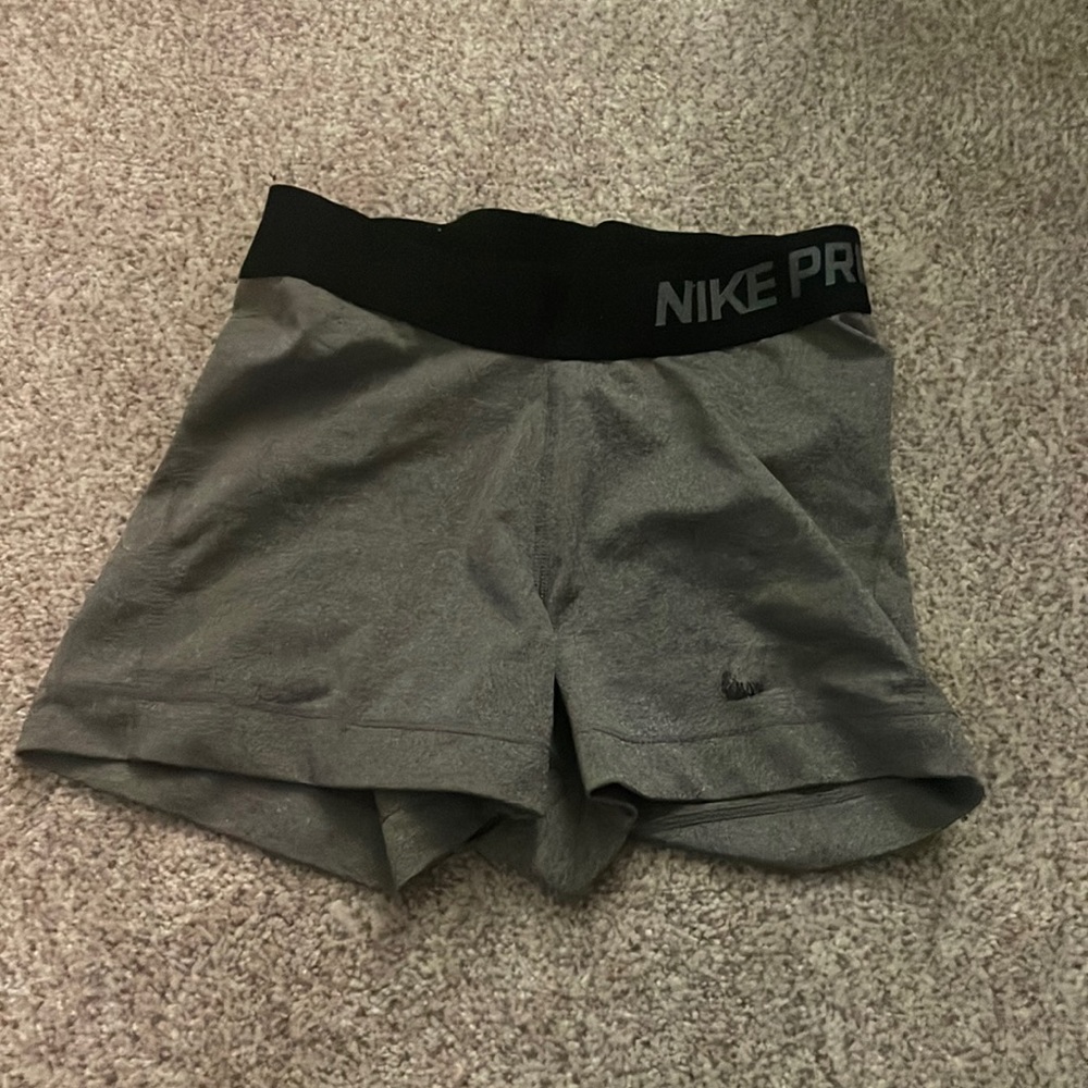 Worn grey Nike pros